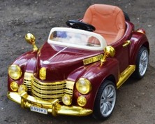 Детский электромобиль RIVERTOYS Bentley бордовый/золото (кожа)